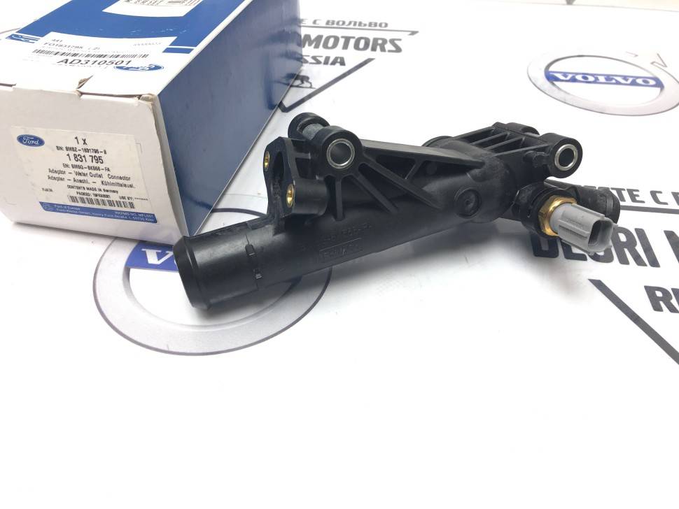 Фланец, адаптер патрубков охлаждения с датчиком \\ Ford Original 1831795