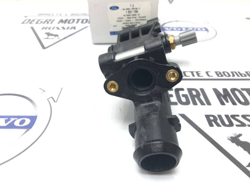 Фланец, адаптер патрубков охлаждения с датчиком \\ Ford Original 1831795