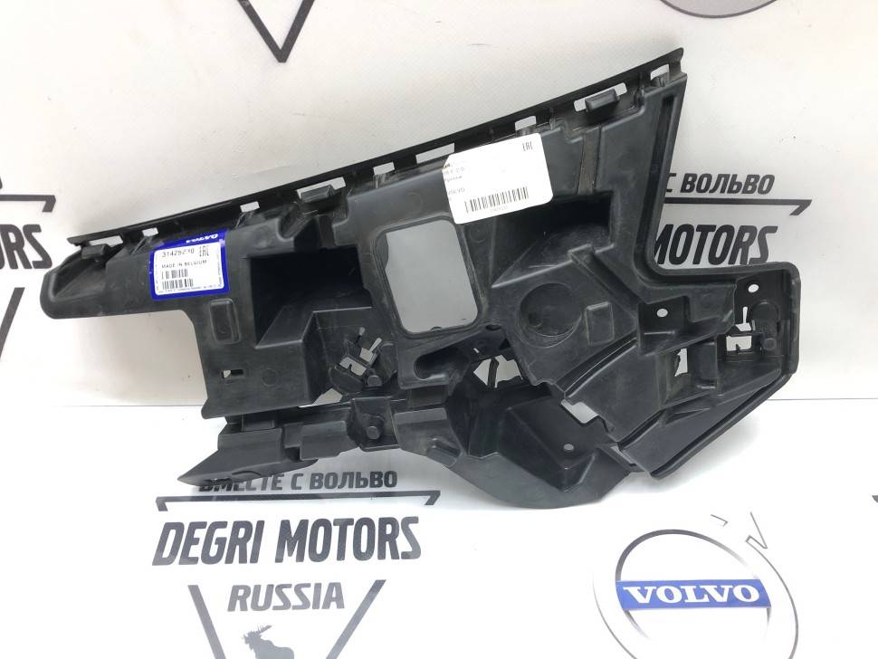Кронштейн форсунки омывателя фары левой VOLVO V40CC \\ VOLVO Original 31425230